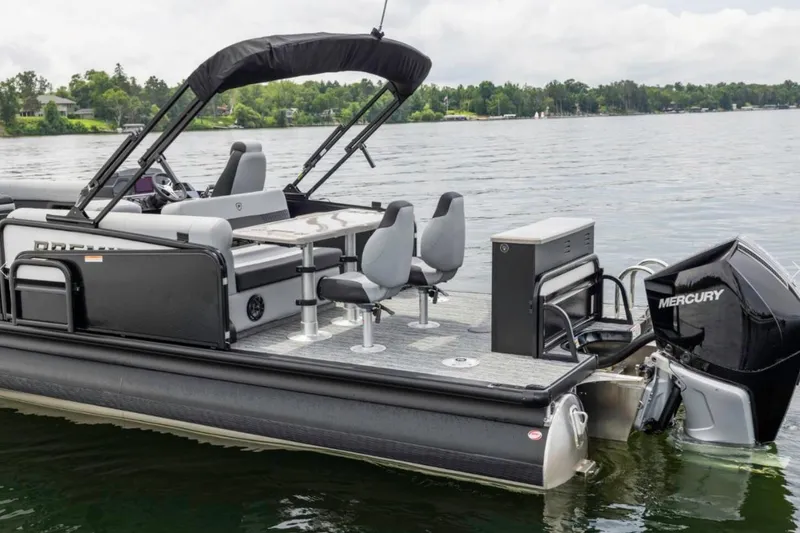 Slide: The Image of 2026 Premier 250 Solaris RS boat interior with tan seating and striped flooring. - 13