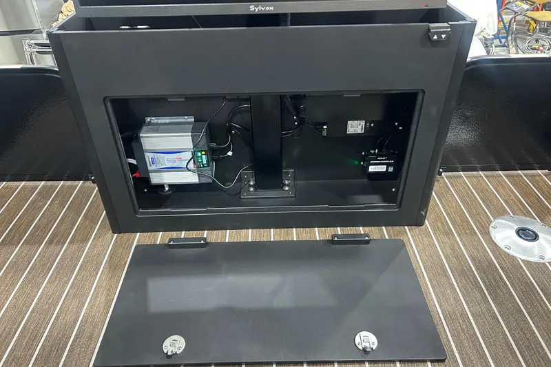 Slide: The Image of Open electrical compartment of 2026 Premier 250 Solaris RS boat, showcasing internal components. - 15