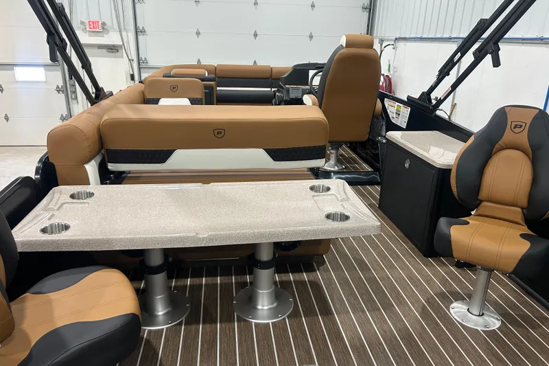 Slide: The Image of Luxurious interior of 2026 Premier 250 Solaris RS boat with seating and table. - 19
