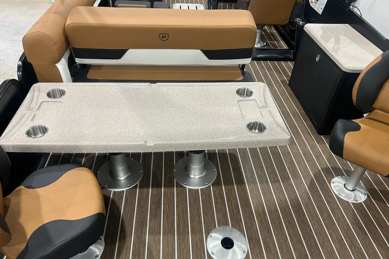 Slide: The Image of Luxurious interior of 2026 Premier 250 Solaris RS with elegant seating and table design. - 20