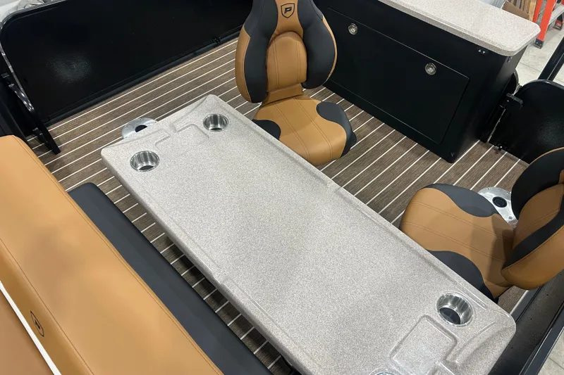 Slide: The Image of Luxurious interior of 2026 Premier 250 Solaris RS boat with stylish seating and table. - 21