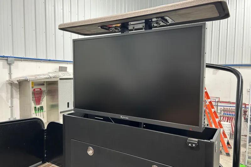 Slide: The Image of 2026 Premier 250 Solaris RS pontoon boat in a showroom setting. - 3