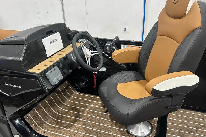 Slide: The Image of Luxurious interior of 2026 Premier 250 Solaris RS boat with leather captain's chair. - 33
