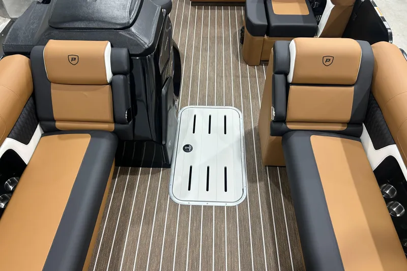 Slide: The Image of Luxurious interior of 2026 Premier 250 Solaris RS boat with tan and black seating. - 39