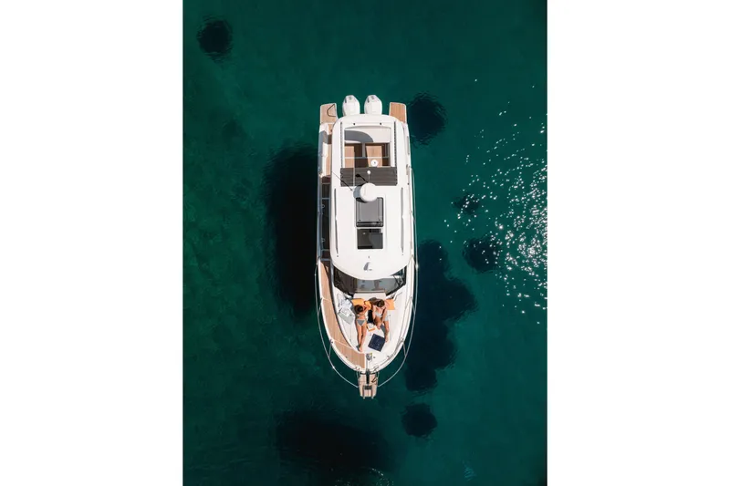 Slide: The Image of Aerial view of Beneteau Antares 9 V2 yacht on clear water. - 17