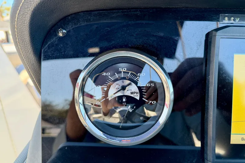Slide: The Image of Speedometer of 2023 Crownline Eclipse E235 XS boat, displaying speed in MPH. - 18