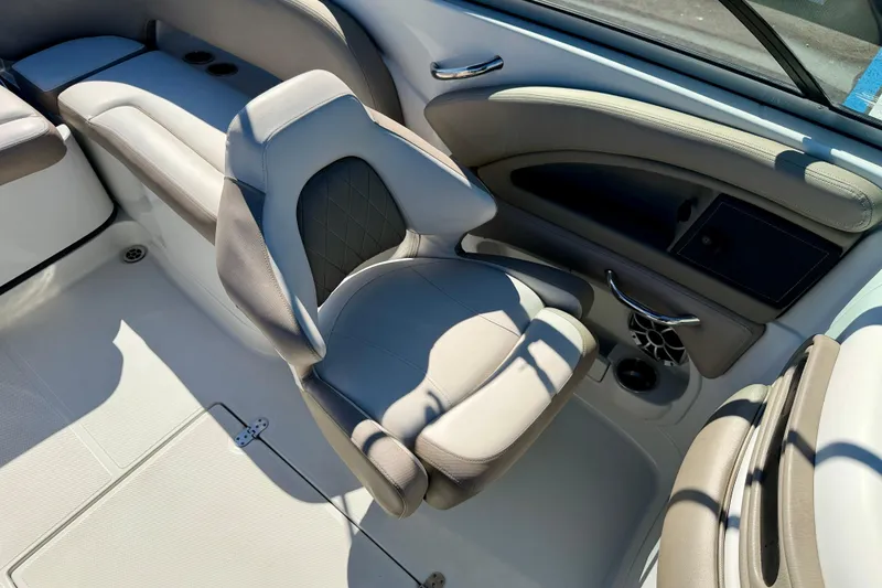 Slide: The Image of 2023 Crownline Eclipse E235 XS boat interior with luxurious seating and modern design. - 22