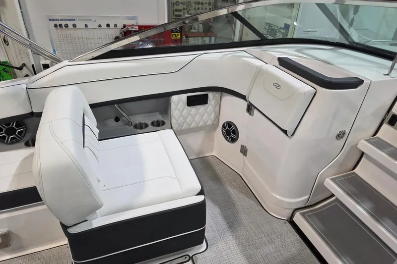 Slide: The Image of Interior of 2026 Regal LS4C boat featuring white seating and modern design elements. - 10