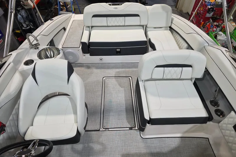 Slide: The Image of 2026 Regal LS4C boat interior with white seating and modern design. - 5
