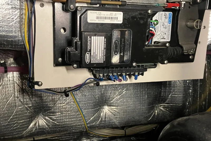 Slide: The Image of Electrical panel inside 2002 Silverton 39 Motor Yacht, featuring wiring and components. - 51