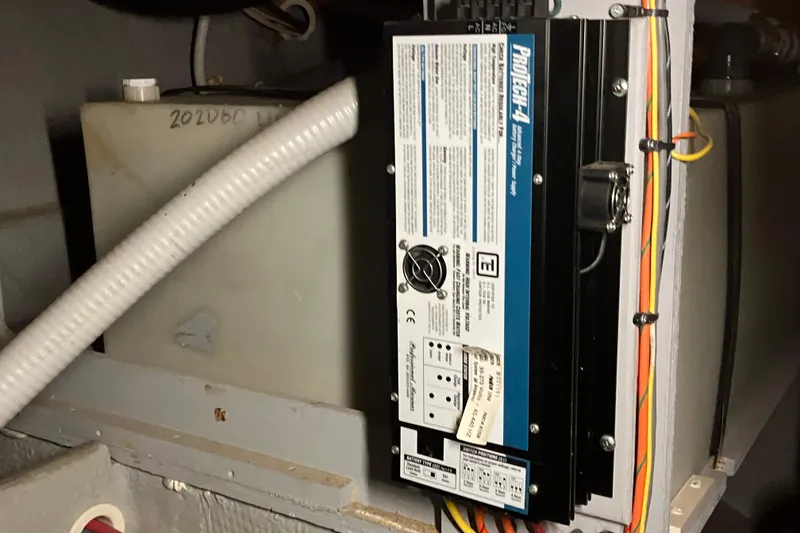 Slide: The Image of Electrical panel and wiring inside a 2002 Silverton 39 Motor Yacht. - 49