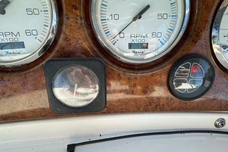 Slide: The Image of Close-up of 2002 Silverton 39 Motor Yacht dashboard gauges and controls. - 12
