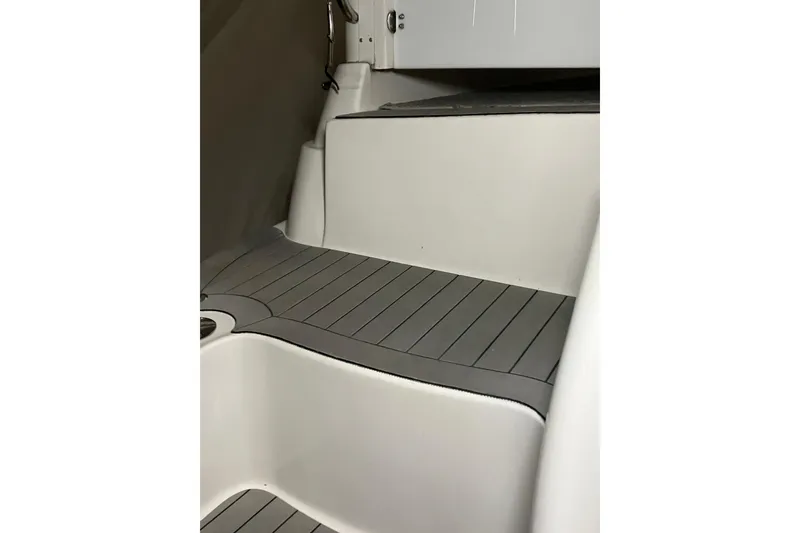 Slide: The Image of 2002 Silverton 39 Motor Yacht interior with sleek, modern steps and gray flooring. - 57