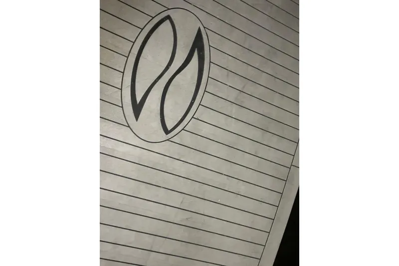 Slide: The Image of Deck of 2002 Silverton 39 Motor Yacht with unique oval logo design. - 58