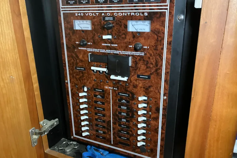 Slide: The Image of Electrical control panel on a 2002 Silverton 39 Motor Yacht, featuring 240V A.C. controls. - 31