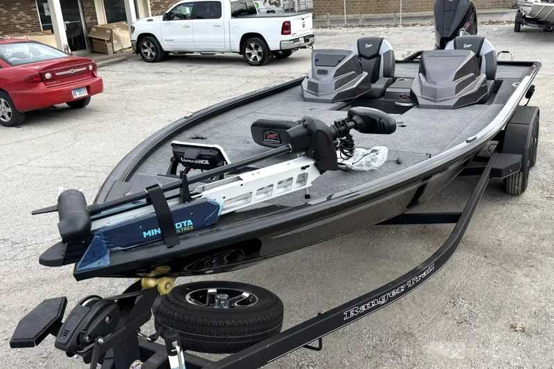 Slide: The Image of 2025 Ranger ALPHA 208 fishing boat with Minn Kota trolling motor on trailer. - 6