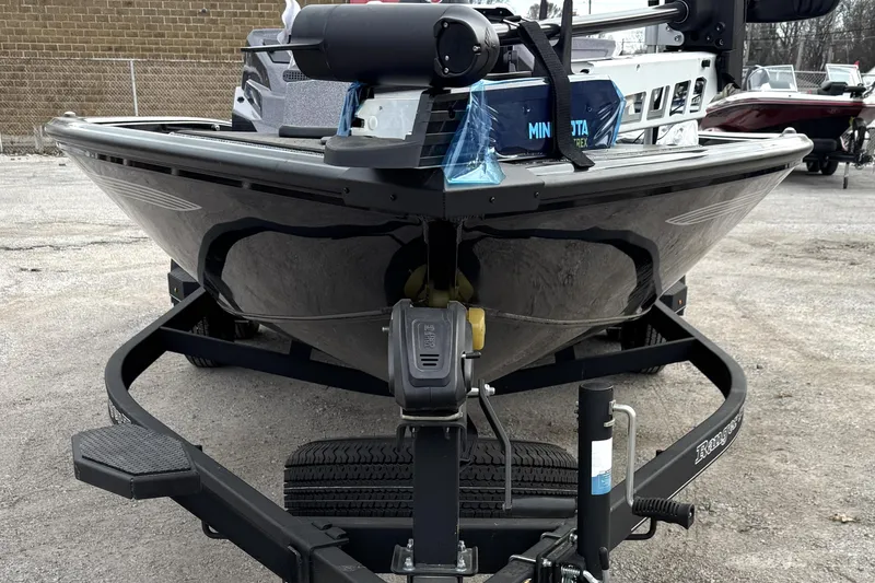 Slide: The Image of 2025 Ranger ALPHA 208 boat on trailer, featuring Minn Kota trolling motor. - 7