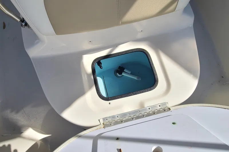 Slide: The Image of Bulls Bay 2000 boat interior with open storage compartment, 2023 model. - 12