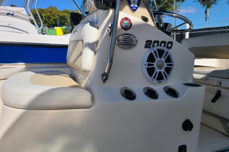 Slide: The Image of 2023 Bulls Bay 2000 boat interior with seating and speaker system. - 13