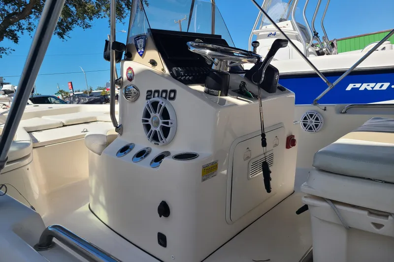 Slide: The Image of 2023 Bulls Bay 2000 boat interior with steering console and seating. - 14