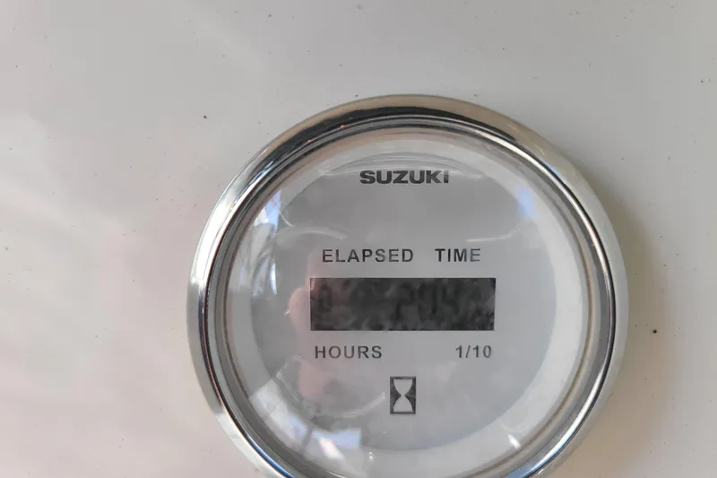 Slide: The Image of Suzuki elapsed time gauge on 2023 Bulls Bay 2000 boat dashboard. - 17