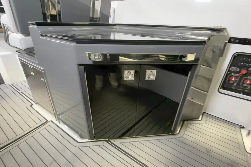 Slide: The Image of 2021 Cobalt A36BR boat interior with sleek cabinetry and modern design. - 17