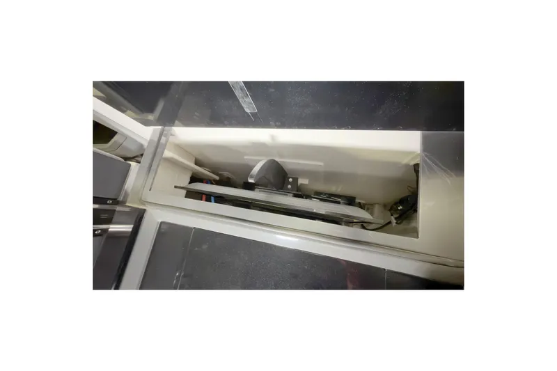Slide: The Image of Interior compartment of 2021 Cobalt A36BR boat, showcasing storage and equipment. - 23