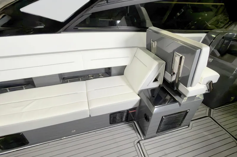 Slide: The Image of 2021 Cobalt A36BR boat interior with white seating and modern design. - 29