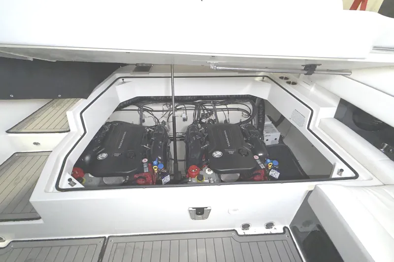 Slide: The Image of 2021 Cobalt A36BR boat engine compartment with dual engines visible. - 38