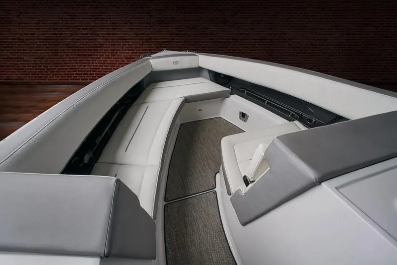 Slide: The Image of 2021 Cobalt A36BR boat dashboard with dual screens and steering wheel. - 9