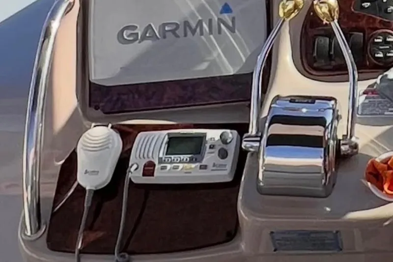 Slide: The Image of Control panel of a 2005 Sea Ray Sundancer 320 with Garmin navigation system. - 2