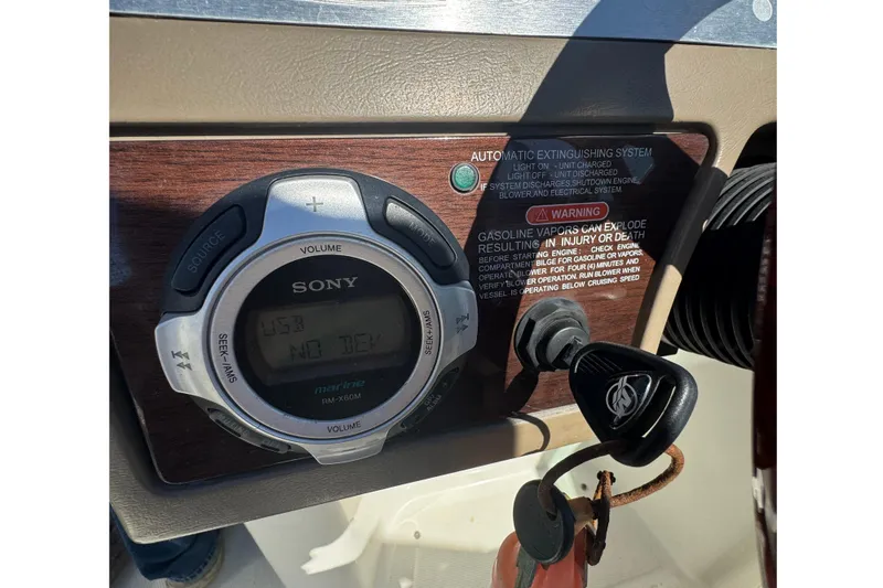 Slide: The Image of Sony marine stereo system on 2011 Sea Ray 260 Bow Rider dashboard. - 12