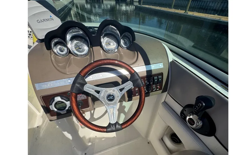 Slide: The Image of Steering console of 2011 Sea Ray 260 Bow Rider with Garmin navigation system. - 6