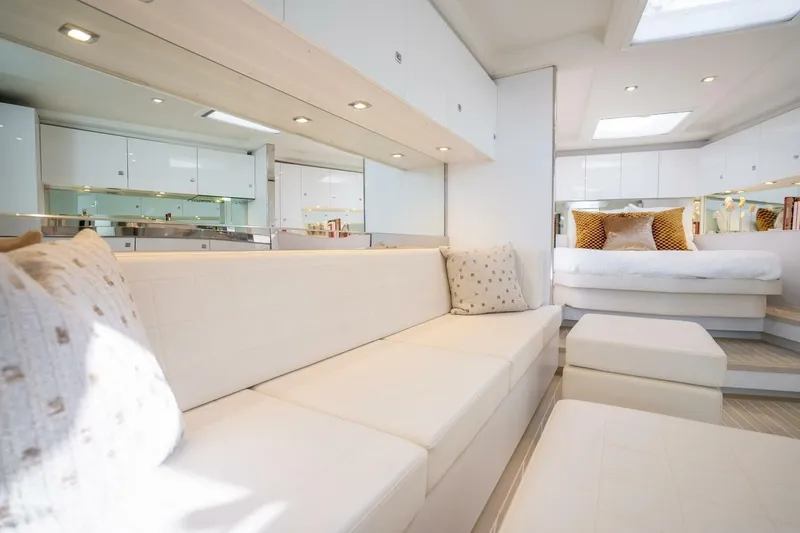 Slide: The Image of Luxurious interior of 2016 VanDutch 55 yacht with elegant white seating and modern decor. - 14