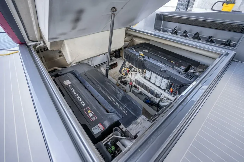 Slide: The Image of Engine compartment of a 2016 VanDutch 55 yacht featuring Volvo Penta engines. - 22