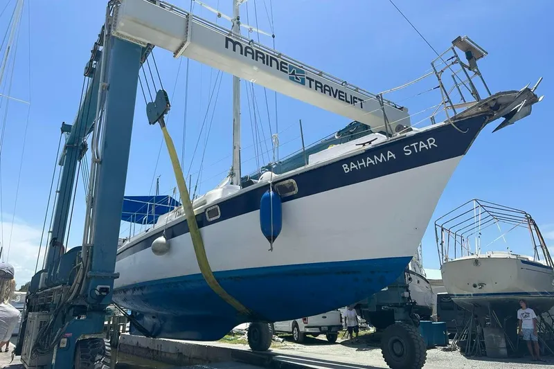 Slide: The Image of 1984 Wellington 57 Sloop "Bahama Star" on a Marine Travelift at a boatyard. - 4