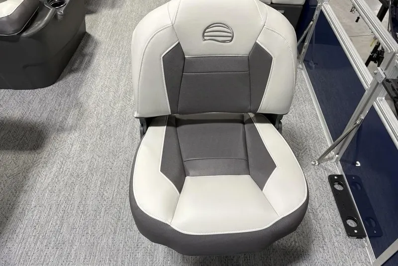 Slide: The Image of 2026 Sun Tracker BASS BUGGY® 18 DLX boat seat, gray and white upholstery, modern design. - 10