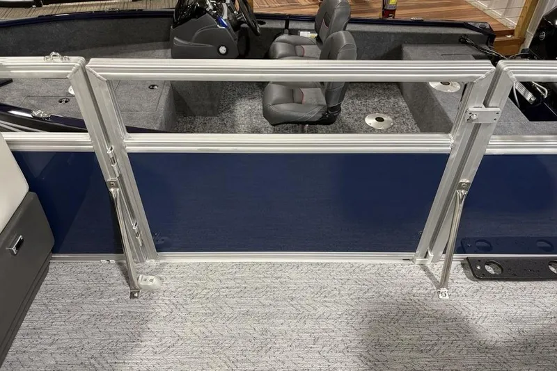 Slide: The Image of 2026 Sun Tracker BASS BUGGY® 18 DLX interior with seating and railing details. - 19