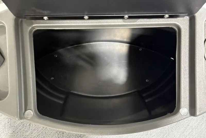 Slide: The Image of Open storage compartment of 2026 Sun Tracker BASS BUGGY® 18 DLX boat. - 7