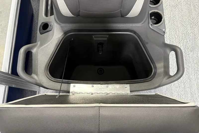 Slide: The Image of 2026 Sun Tracker BASS BUGGY® 18 DLX storage compartment with cup holders and seating. - 8