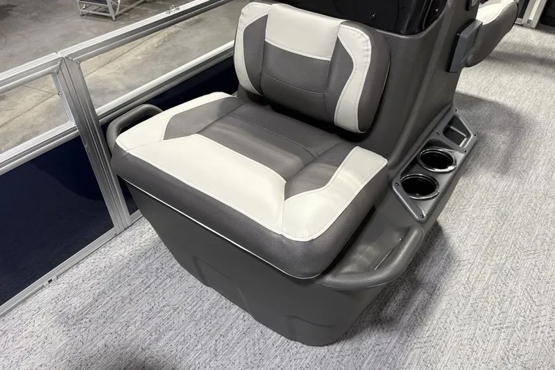 Slide: The Image of 2026 Sun Tracker BASS BUGGY® 18 DLX boat seat with cup holders, gray and white design. - 9