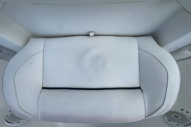 Slide: The Image of 2016 Sea Hunt Ultra 211 boat seat, white upholstery, top view. - 106