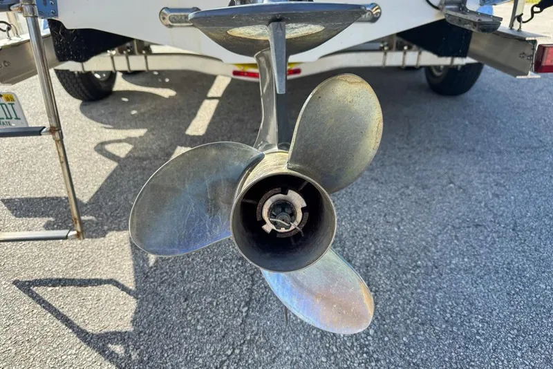Slide: The Image of Propeller of a 2016 Sea Hunt Ultra 211 boat on a trailer. - 110