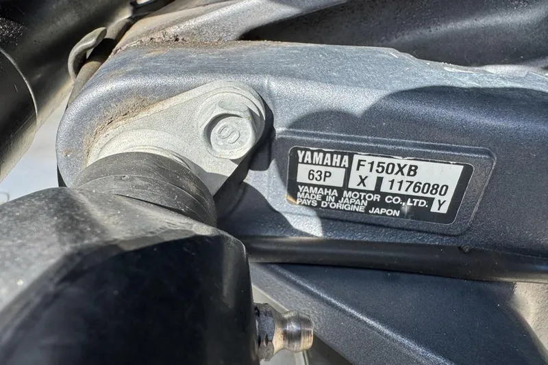 Slide: The Image of Close-up of Yamaha F150XB engine label on 2016 Sea Hunt Ultra 211 boat. - 114