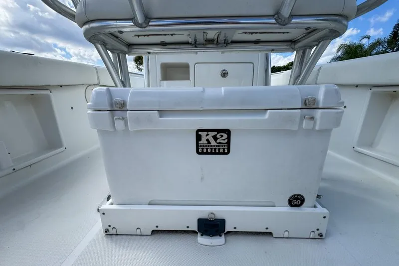 Slide: The Image of 2016 Sea Hunt Ultra 211 boat with K2 cooler on deck. - 38