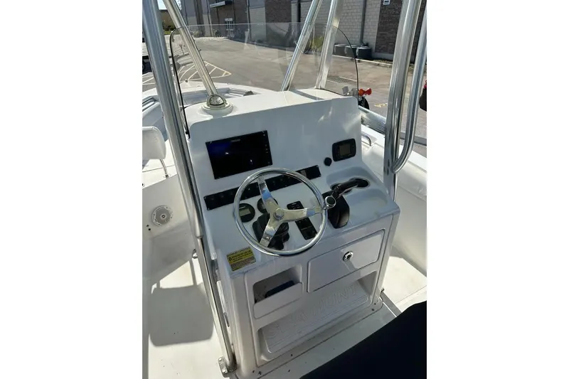 Slide: The Image of Propeller of a 2016 Sea Hunt Ultra 211 boat on a trailer. - 6