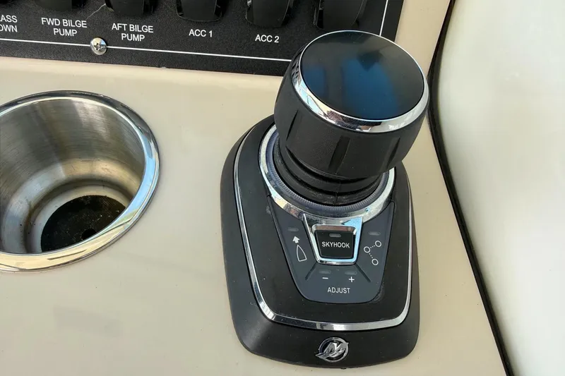 Slide: The Image of Joystick control panel on 2025 Boston Whaler 285 Conquest boat dashboard. - 40