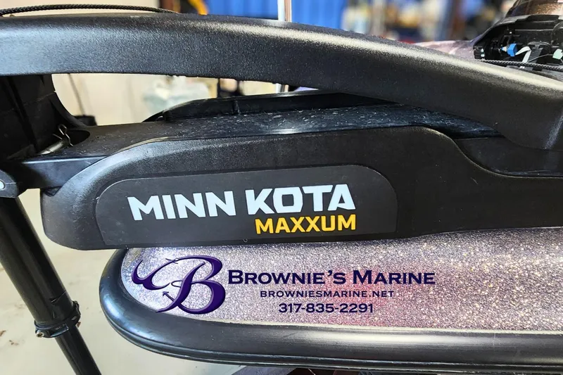 Slide: The Image of Minn Kota Maxxum motor on Triton Tr-165, 2003 model, with Brownie's Marine branding. - 3