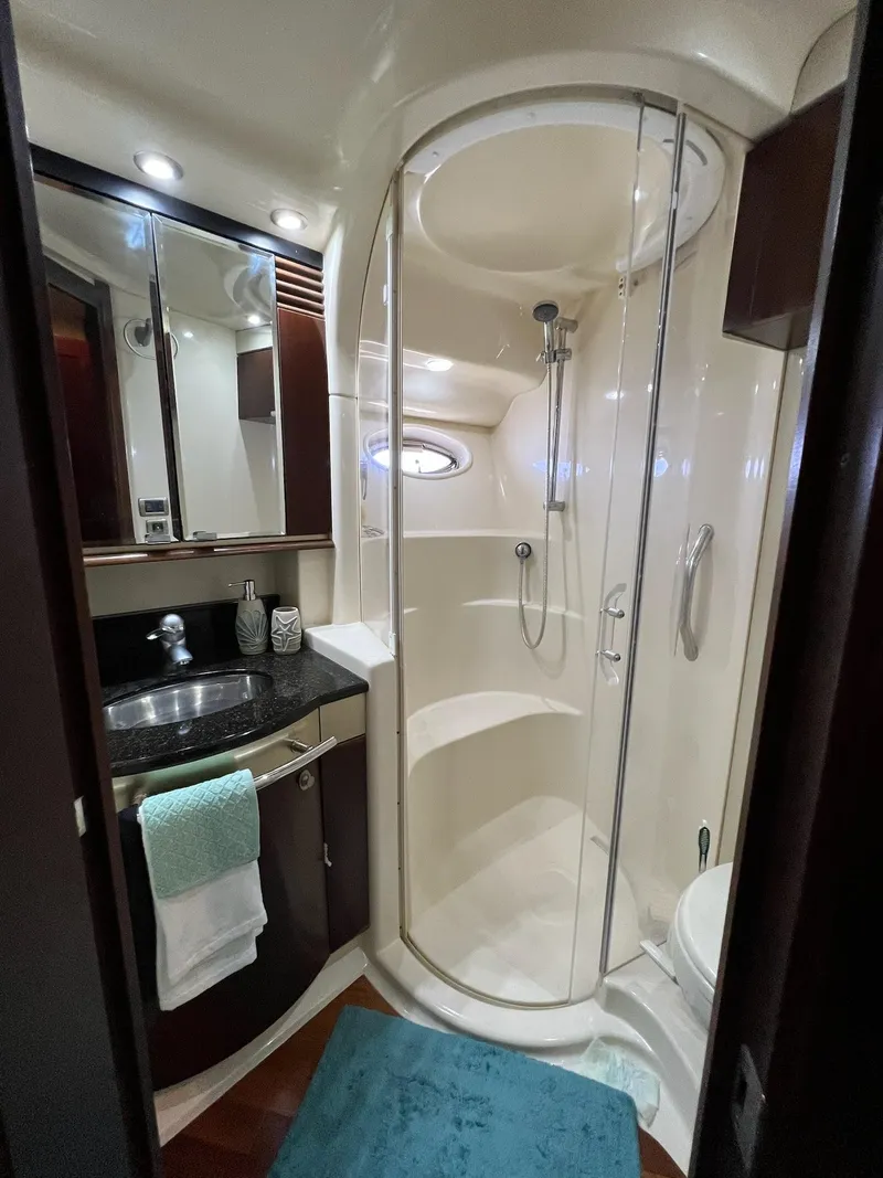 Slide: The Image of Luxurious bathroom in 2005 Sea Ray 500 Sedan Bridge yacht with modern shower. - 20