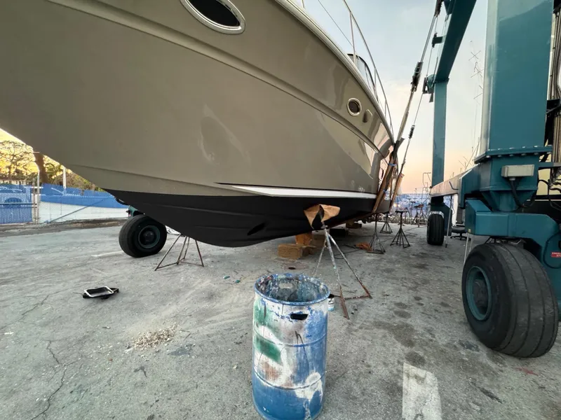 Slide: The Image of 2005 Sea Ray 500 Sedan Bridge yacht in dry dock for maintenance. - 4